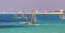 Κάνοντας windsurf στην παραλία του Άη Γιάννη