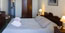 Δίκλινο υπνοδωμάτιο με διπλό κρεβάτι, θέα θάλασσας και βεράντα